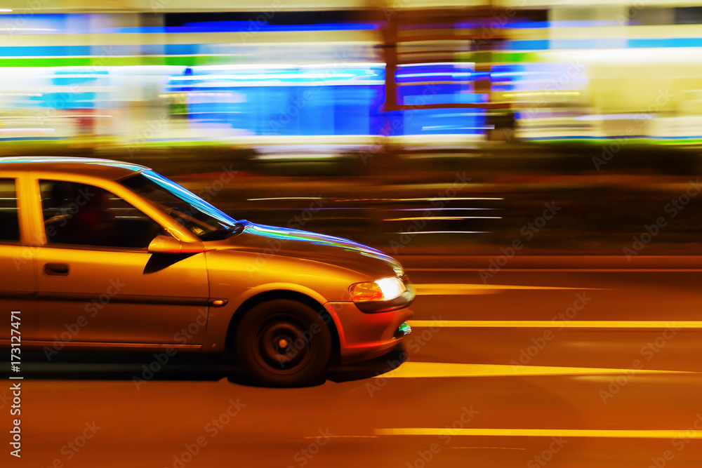 car in night city traffic