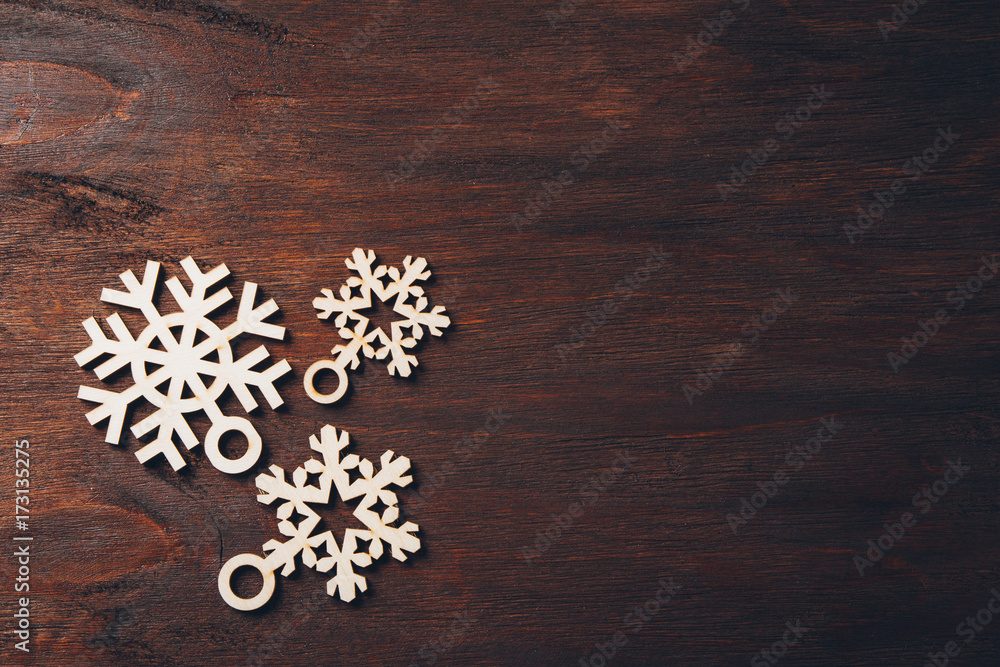 Wooden snowflakes on a dark background Wooden snowflakes on a dark background