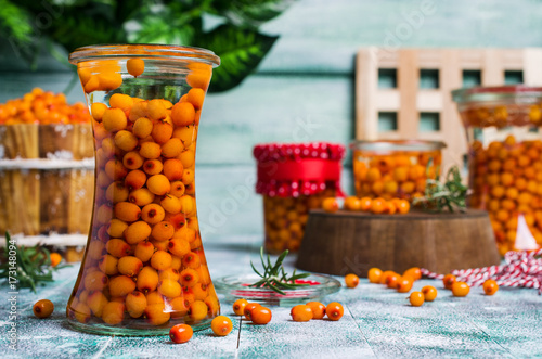 Berries of sea buckthorn with syrup