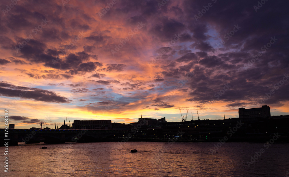 Sunset on the River Thames in London England.