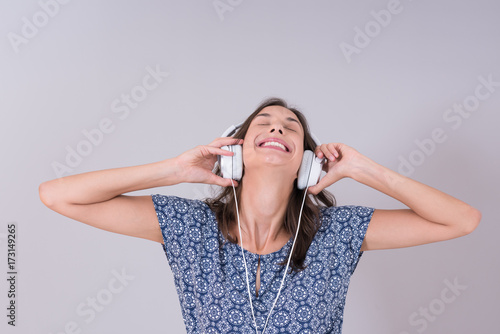 woman with headphones isolated on a white