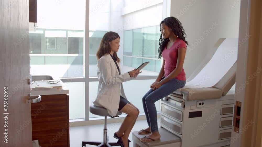 Doctor In White Coat Meeting With Female Patient Doctor In White Coat Meeting With Female Patient