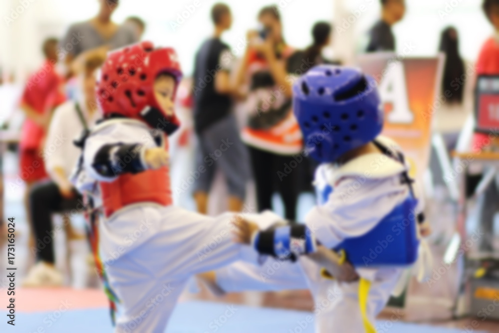 blurred background of Young Taekwondo athletes are fighting during contest blurred background of Young Taekwondo athletes are fighting during contest
