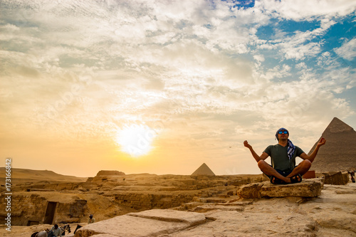 Meditation near the pyramids in Cairo, Egypt