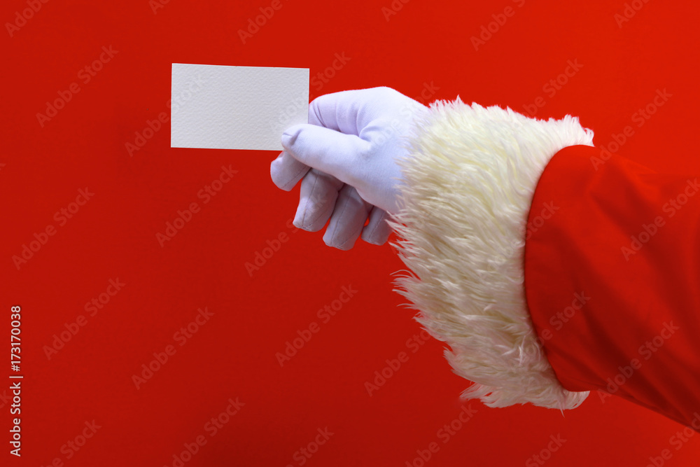 custom made wallpaper toronto digitalSanta Claus hand presenting your christmas text or product over red background with copy space