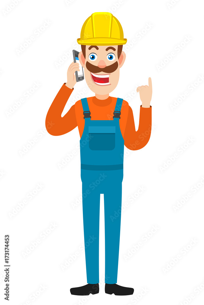 Builder talking on mobile phone and pointing up Builder talking on mobile phone and pointing up