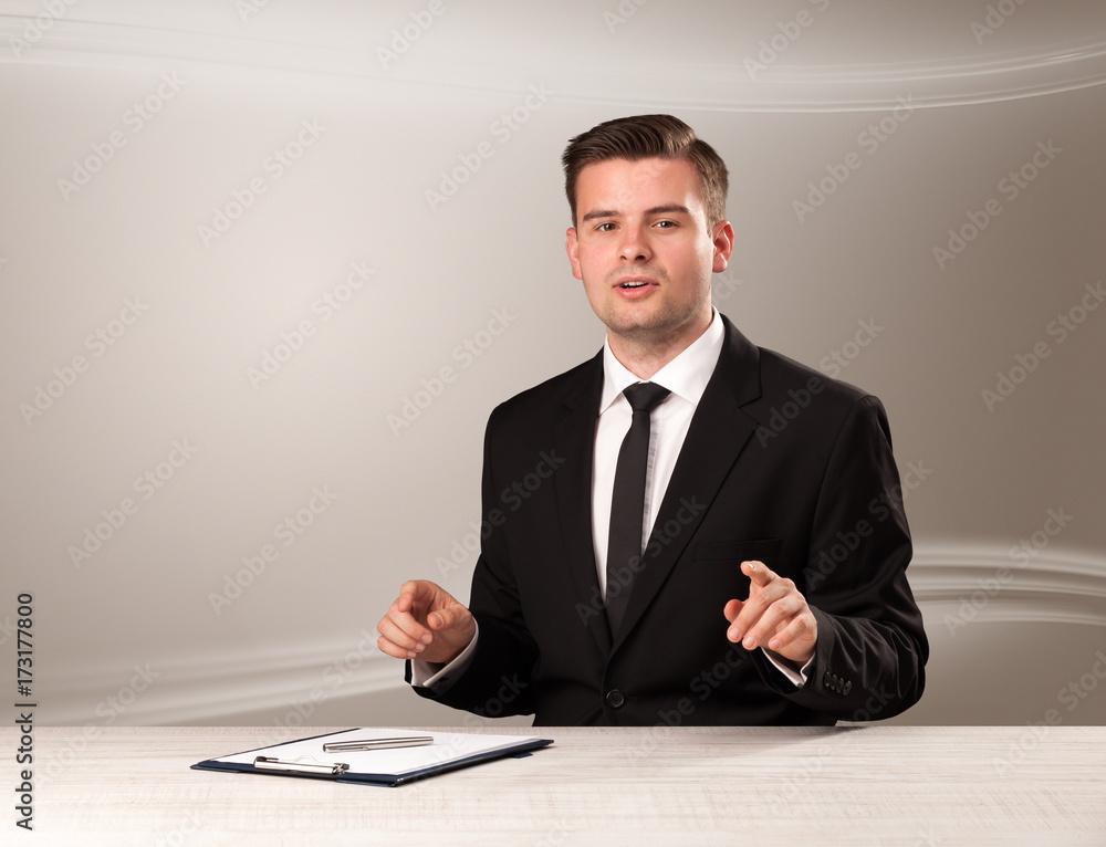 Televison host in live show with blank background Televison host in live show with blank background