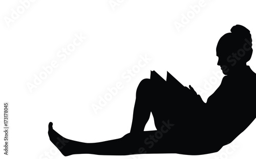 Woman reading a book silhouette