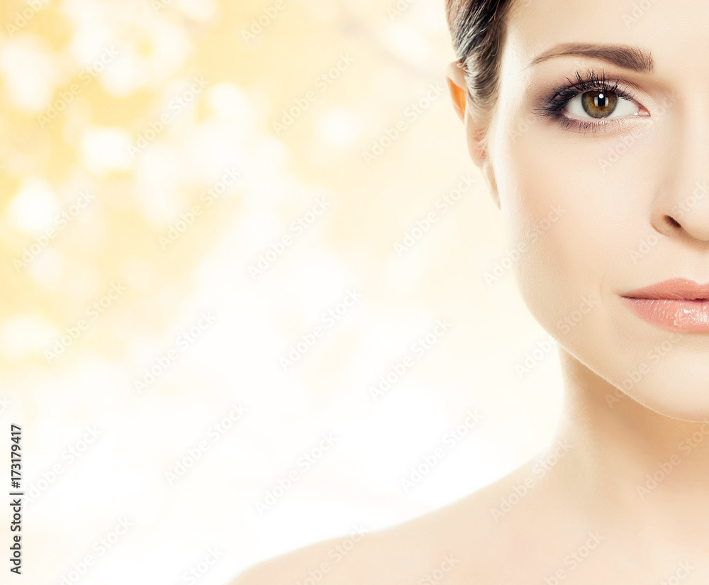 Portrait of young, beautiful and healthy woman: over orange background. Healthcare, spa, makeup and face lifting concept. Portrait of young, beautiful and healthy woman: over orange background. Healthcare, spa, makeup and face lifting concept.