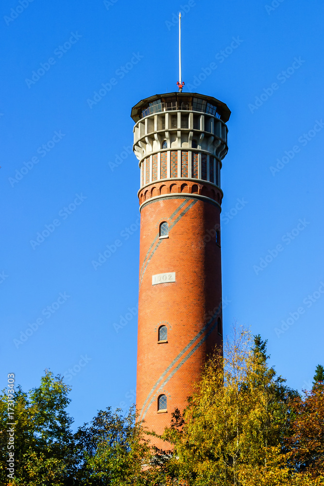 Lookout tower in a forest with autumn colors