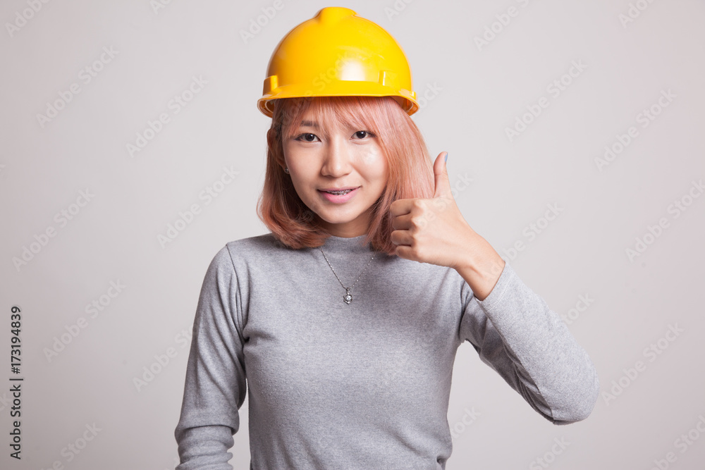 Asian engineer woman show thumbs up. Asian engineer woman show thumbs up.