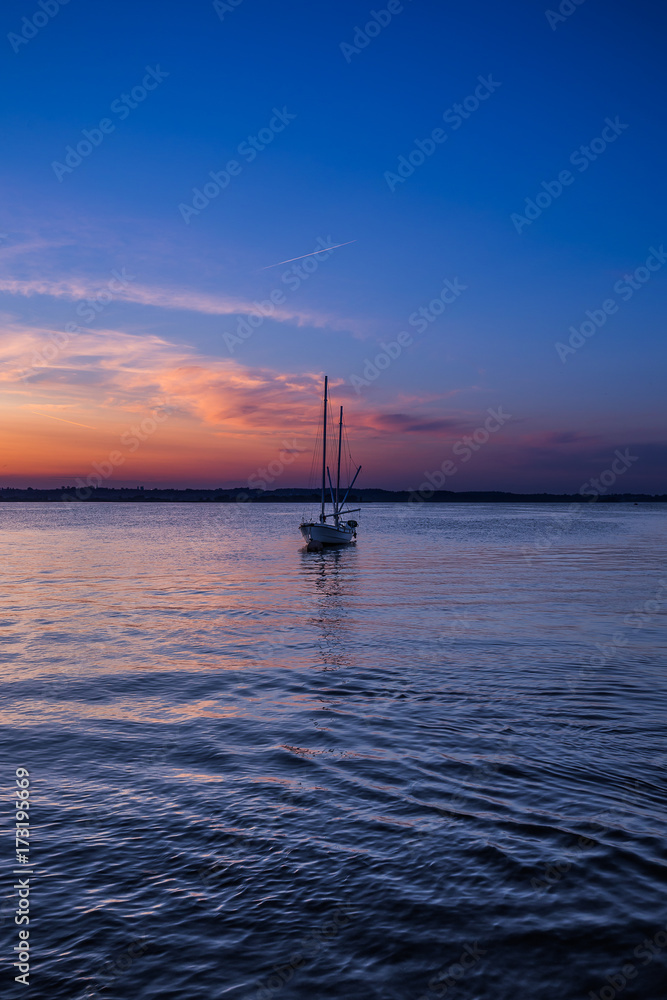Fototapeta premium Beautiful sunrise over the beach in Rewa Poland