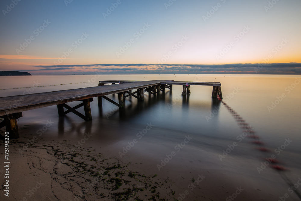 Anazing sunrise over the sea. Pier in Sopot.