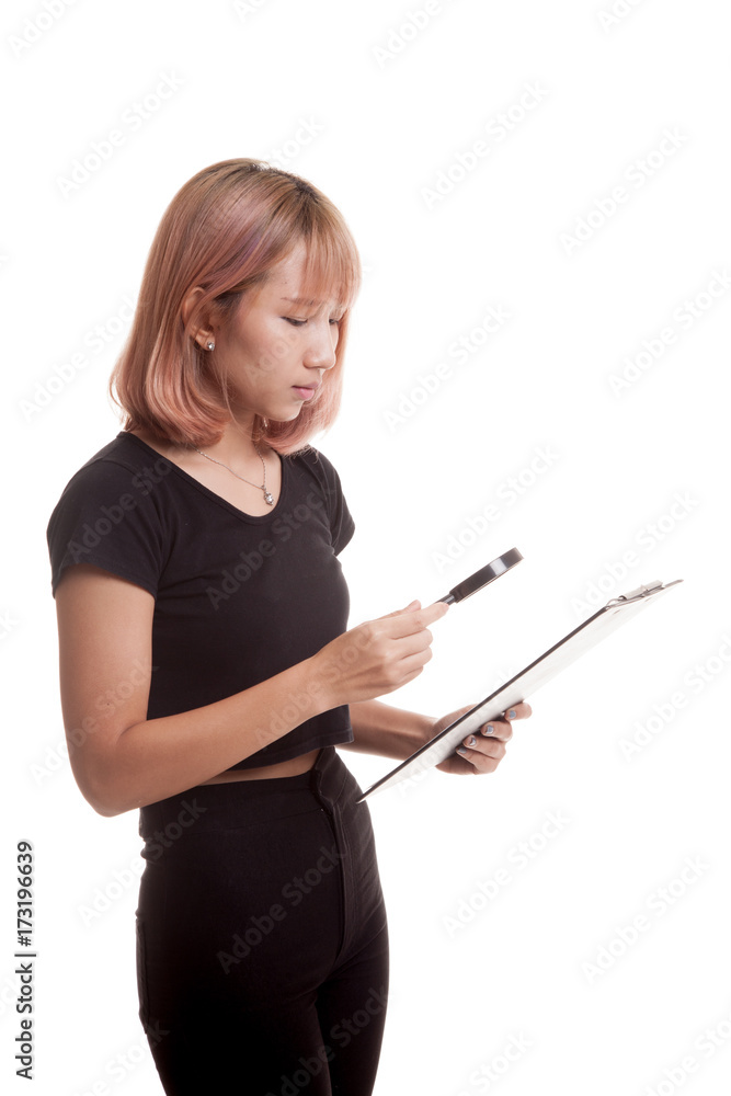 Young Asian woman with a magnifying glass check report. Young Asian woman with a magnifying glass check report.
