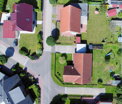Photography Aerial photo with the drone, anew build-up plot with single houses and gardens,