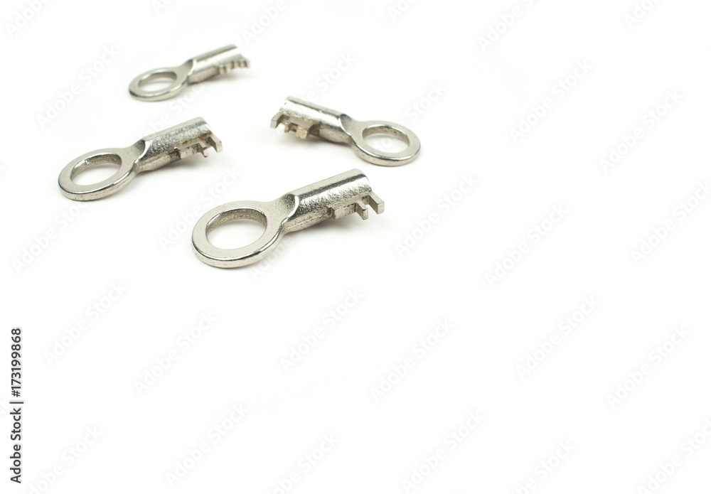 Four chrome keys on a white background with text space. Security concept. Four chrome keys on a white background with text space. Security concept.