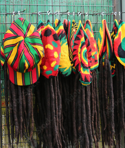 hats with the colors of the Jamaican flag for sale in the costum photo