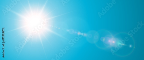 Sunny background, blue sun with lens flare