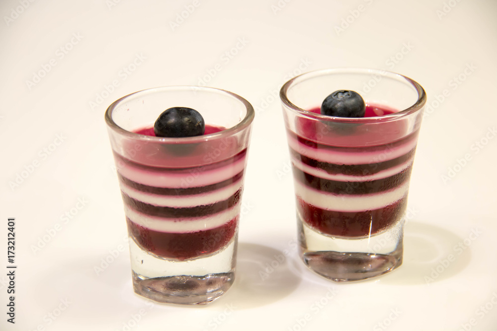 Jelly in glass with fruit blueberry on top Jelly in glass with fruit blueberry on top