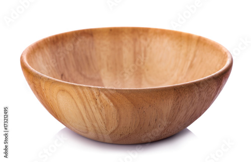 Wooden bowl isolated on white background photo