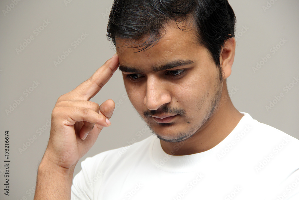 expressions of young amazed man isolated on gray background expressions of young amazed man isolated on gray background