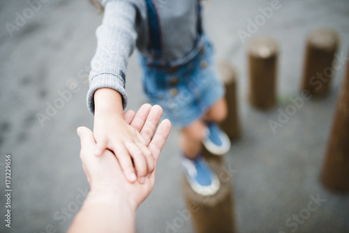 Photos Parent and child playing in the park