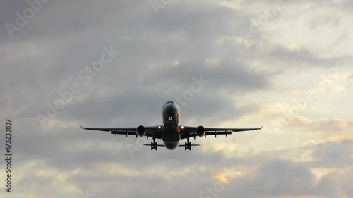 passenger airplane taking off , low pass