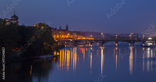 Night city. The historical center of Prague at night. Vltava River and Old town of Prague, Czech Republic. 