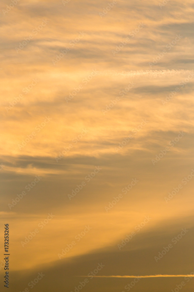 clouds in the sky at sunset as background