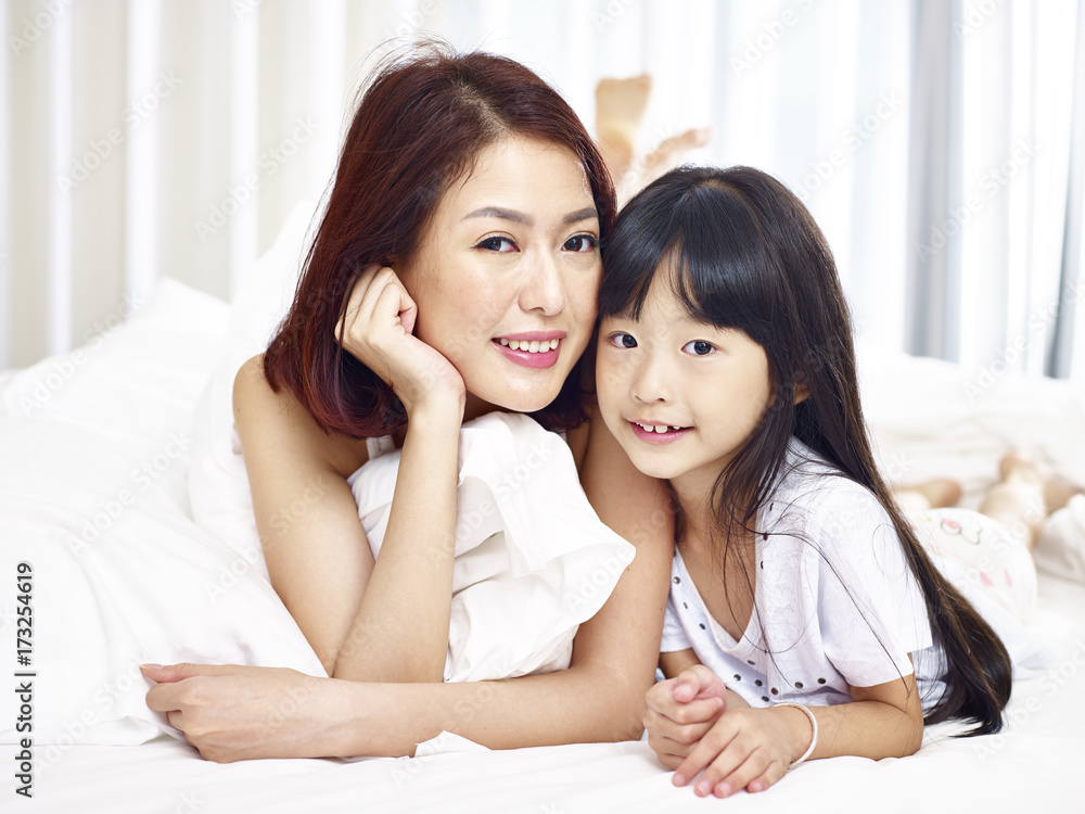 portrait of asian mother and daughter portrait of asian mother and daughter