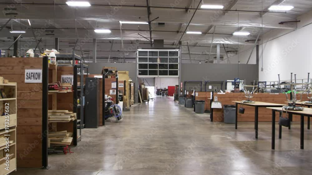 Interior Of Factory With Empty Work Benches Shot On R3D Interior Of Factory With Empty Work Benches Shot On R3D