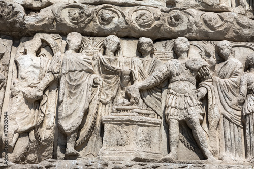 Details of Arch of Galerius in Thessaloniki, Greece depicting philosophers of antique Greece photo