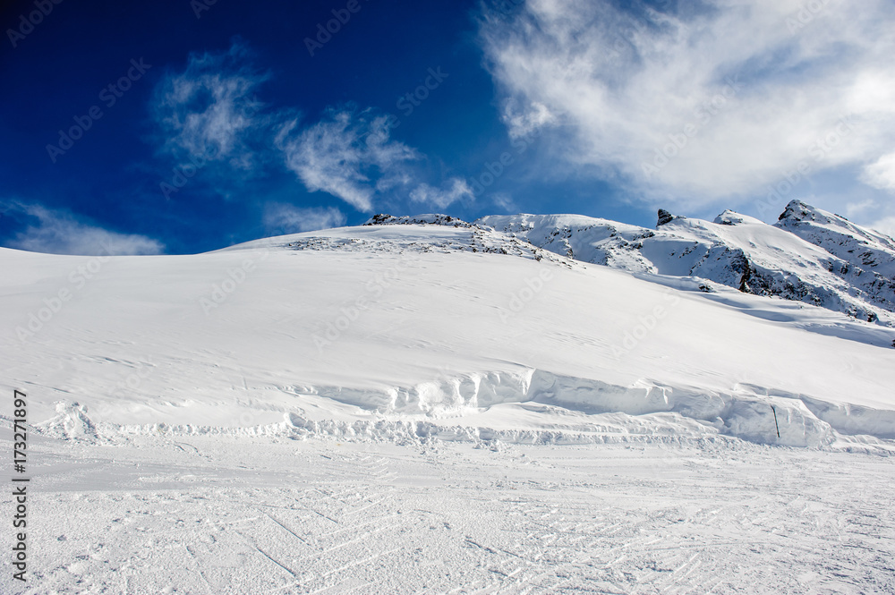 Obraz premium Alpine winter mountain landscape. French Alps with snow.