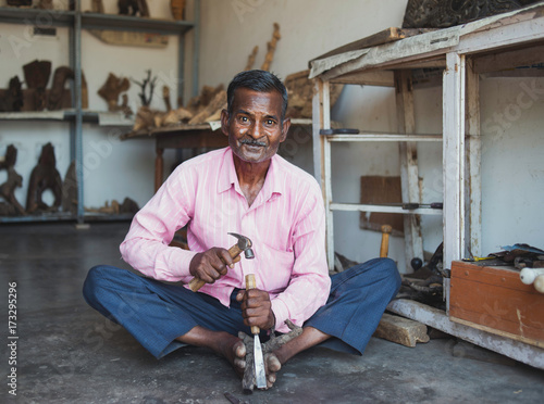Portrait of a craftsman of wood in his workshop © inigocia