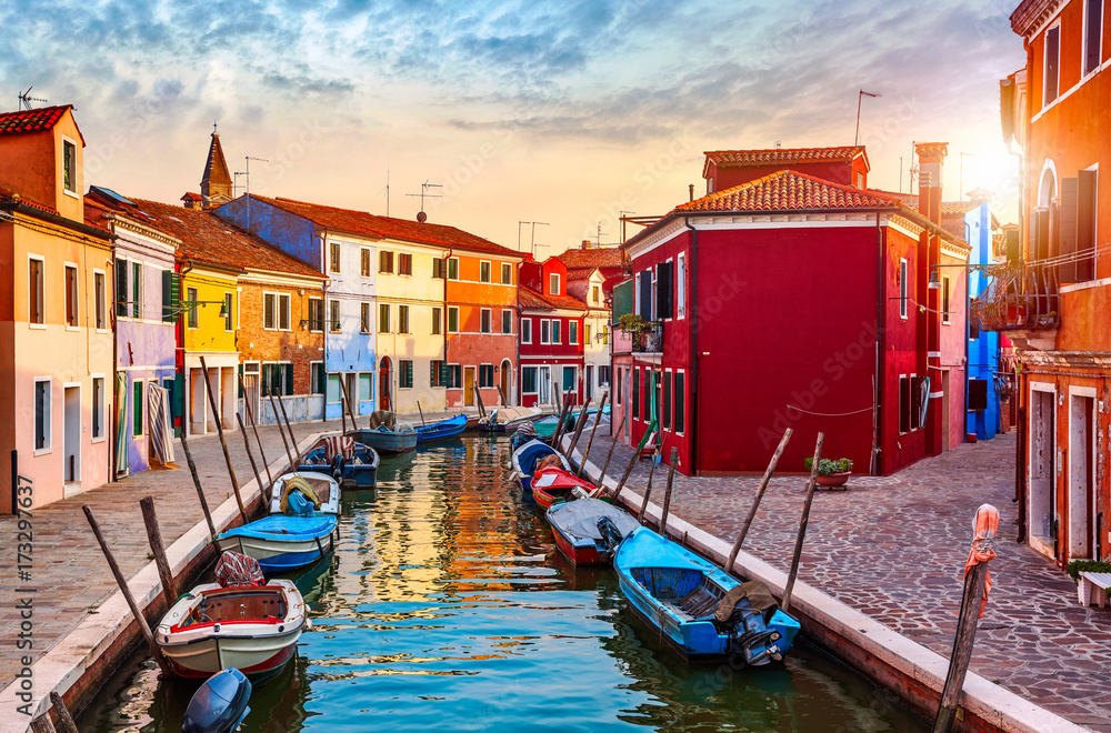 Burano island in Venice Italy picturesque sunset over canal - obrazy, fototapety, plakaty 