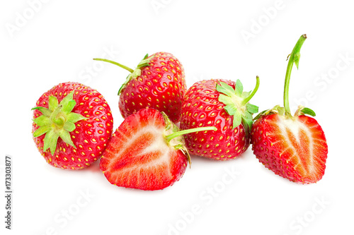 three berries of ripe juicy strawberries on white table