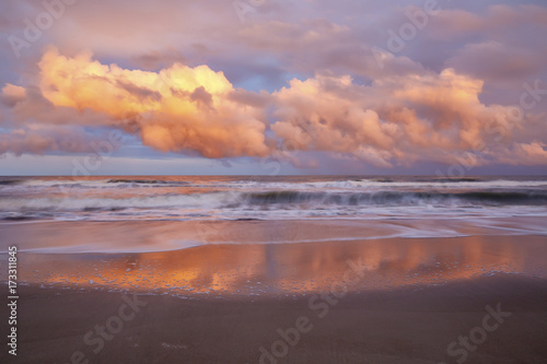 Ocean waves and clouds near sunset, Kure Beach, North Carolina, USA