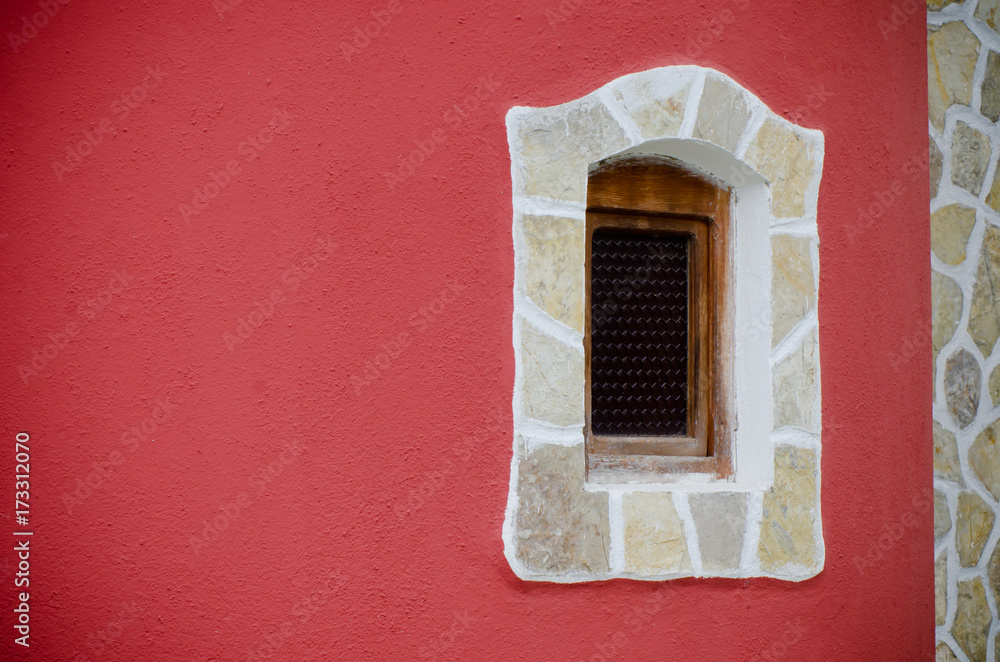isolated window and red wall