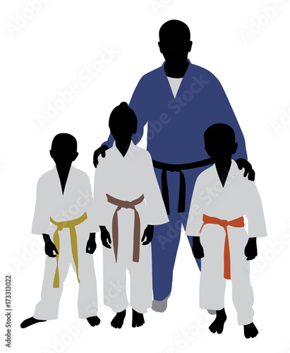 Judo team. Judo trainer with kids.