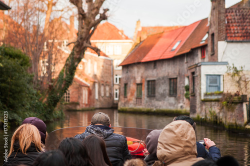 Boat excursion on canal in Bruges, Belgium.