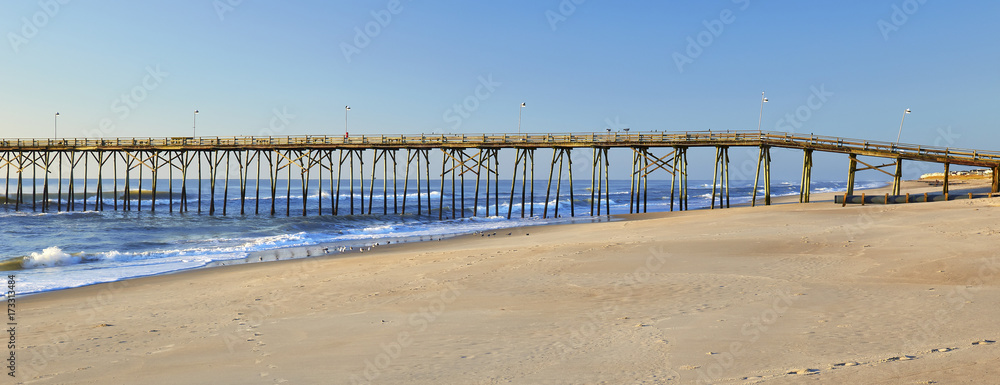 Ocean waves and fishing pier at Kure Beach, North Carolina