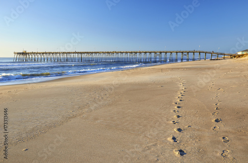 Fishing pier and sand at Kure Beach, North Carolina