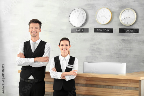 Female and male receptionis...