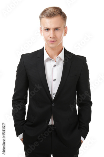 Young man in black suit on ...