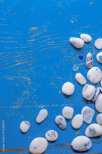 Pebbles on shabby surface, decorative stouns photo