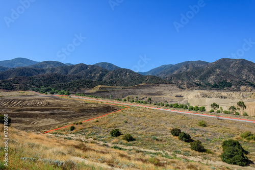 Construction and industry next to Southern California forest area