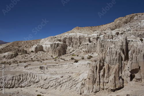 Eroded rock formations along Quebrada Chuba, a river valley high on the Altiplano of northern Chile in Lauca National Park.