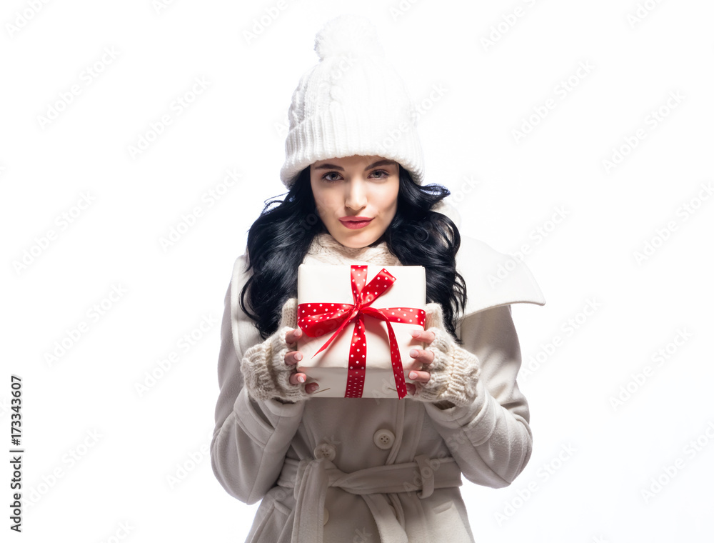 Young woman holding a Christmas gift box Young woman holding a Christmas gift box