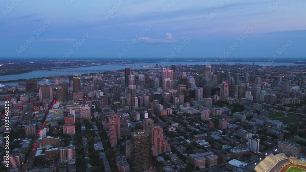 Montreal Quebec Aerial v98 Flying across downtown at dusk with cityscape views 7/17 Montreal Quebec Aerial v98 Flying across downtown at dusk with cityscape views 7/17