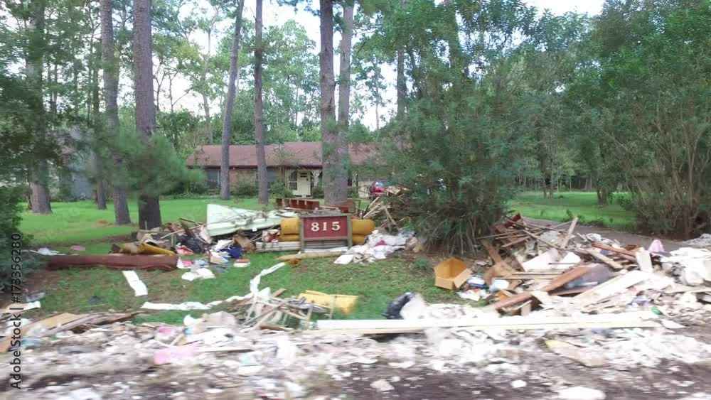 Devastated neighborhoods in Dickinson Texas. Trash and debris on the